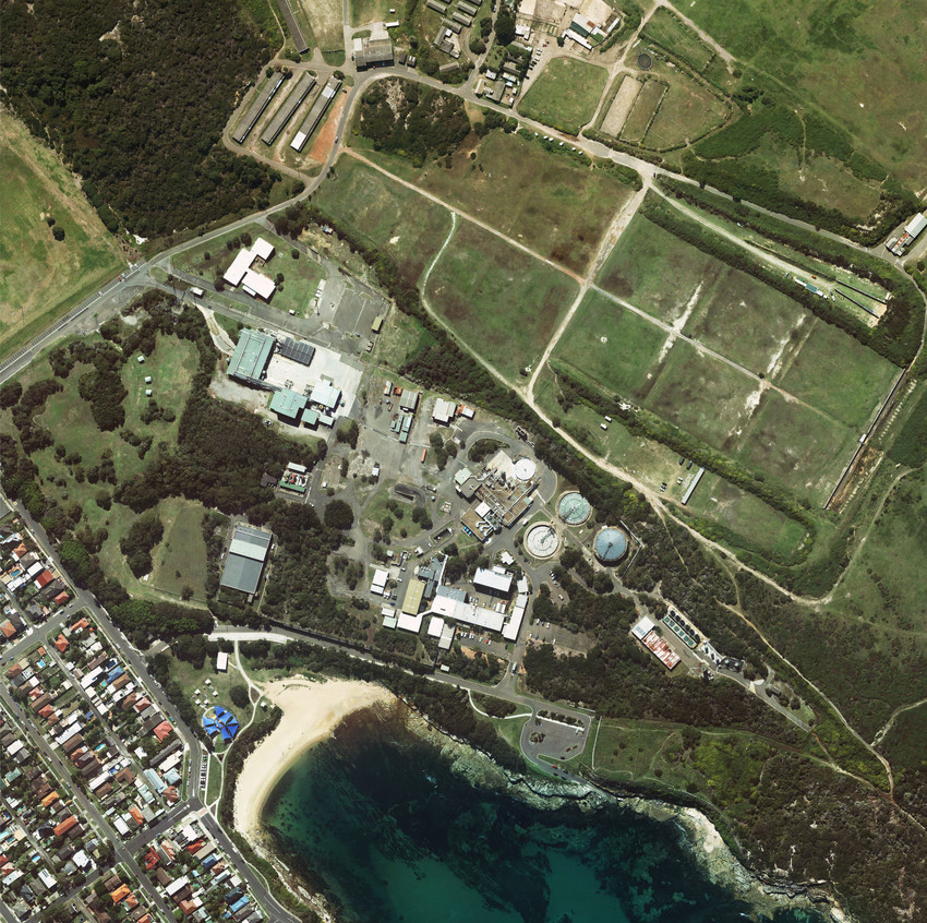 Aerial view of the Malabar Water Resource Recovery Facility surrounded by land and houses