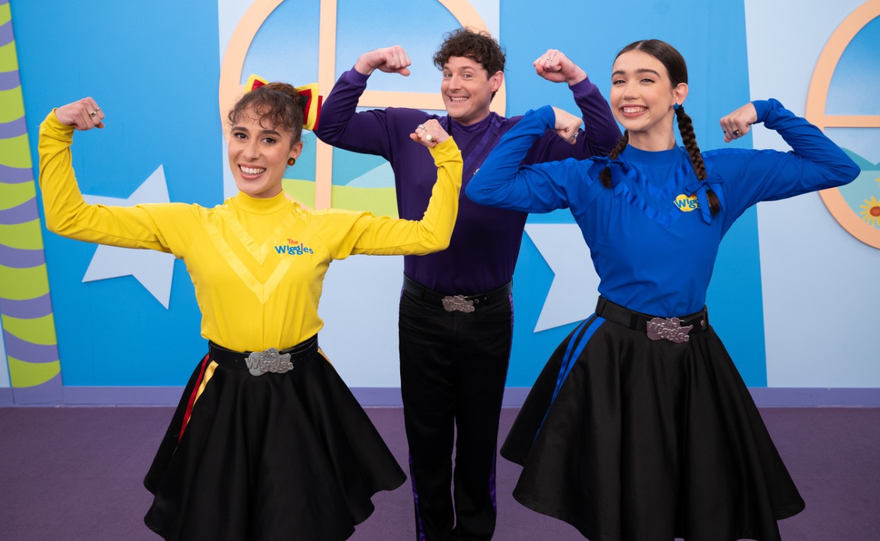 All eight of The Wiggles dancing to The Wiggles' song.